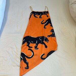 Orange and black printed dress with gold chain straps. Size medium